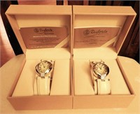 Lot #2143 - (2) Dufonte white leather watches