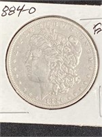 1884 - O - Morgan Silver Dollar E.f