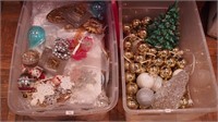 Two containers of Christmas decorations