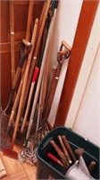 Collection of hand tools: shovels,