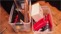 Two containers of kitchenware: cutting boards,