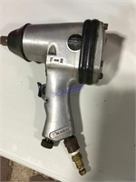 Central pneumatic impact wrench