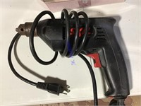 Skil electric drill with chuck