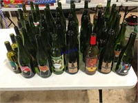 50 empty green glass wine bottles