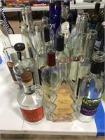 22 clear wine / liquor bottles