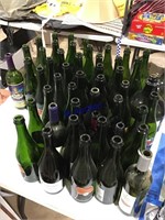 50 green wine / liquor bottles
