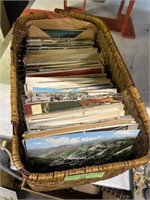 Basket of Mostly Vintage Travel Postcards.