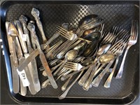 Tray of assorted flatware.