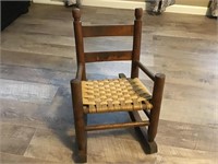 Grass string bottom mini wood rocking chair. 21”H