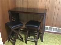 Decorative wood table w/ matching stools. Made in