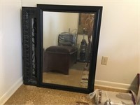 Plastic framed beveled mirror. Dims: 41”H x 29”W