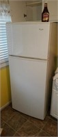 Late model Whirlpool refrigerator with ice maker