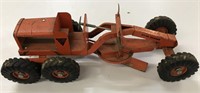 large red toy farm implement