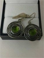 Silver earrings with peridot.  Sugg ret $189