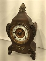 Ansonia Iron cased Mantle clock, porcelain and