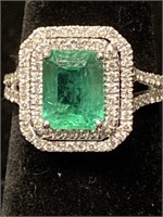 PLATINUM EMERALD AND DIAMOND RING