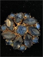 ROUND BLUE CRYSTAL TYPE BROOCH