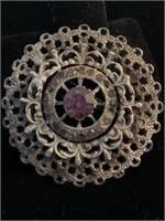 SILVER ROUND BROOCH W/ PURPLE COLOR STONE TYPE