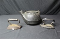 Two Sad Irons & Teapot