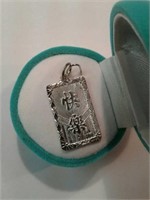 Silver 925 charm/pendant says 'happiness'
