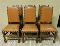 Shield Carved Leather and Oak Chairs.