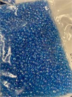 Toho 10/0 glass round C beads. Light blue three