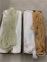 Plastic pearls. 5 mm round two colors yellow and