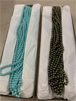 Plastic pearls 6 mm. Two boxes with 72 strands