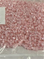 Toho 15/0 hex seed bead. Luster pink. Two boxes