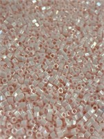 Toho 15/0 hex seed bead. Luster pink two boxes