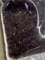 1215/0 hex seed beads. Opaque maroon brown. Three