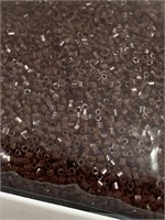 Toho 15/0X seed beads. Opaque maroon brown. Two