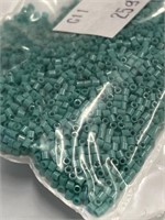 Toho 15/0X seed bead. Opaque turquoise. Two boxes