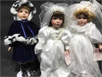 3 porcelain collectors dolls, 16 in H, on stands