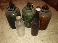 lot of large glass bottles