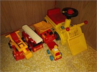 lot of vintage toys , dump trucks , fire trucks