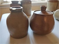 2 primitive pottery jugs largest 6x7''