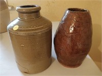 2 primitive pottery jugs largest 7x11''