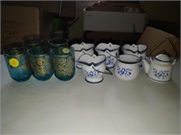 lot of cups , and miniature buckets
