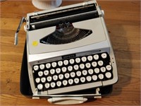 Smith Corona portable typewriter in case