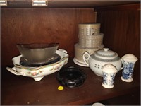 lot of shakers , plates , bowls etc.