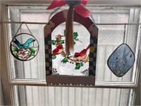 lot of hanging stain glass pieces