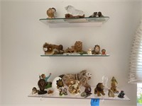 Assorted shelves of lions, cars and misc.