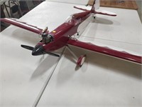 burgundy and white remote controlled plane