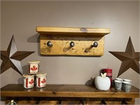 Three-peg wooden shelf