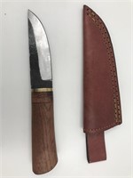 Fixed bladed outdoor knife, stacked brass and wood