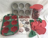 Assorted cookie cutters and candy molds