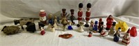 Early figurines and a Vintage Noise Maker