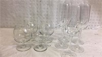 5 Crystal Wine Glasses and 4 Glass Wine Glasses