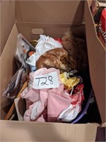 Box of children's costumes and kitchenware